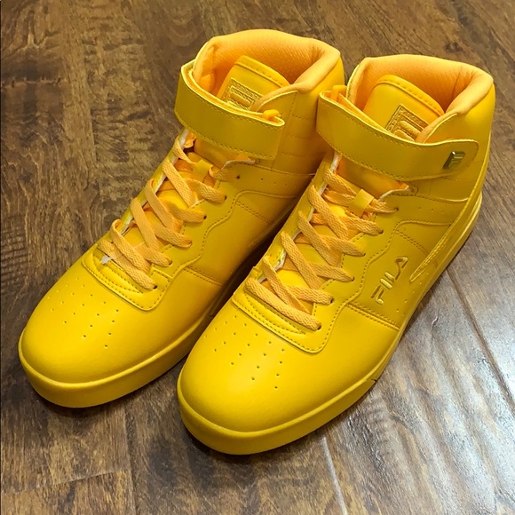 fila black and yellow sneakers